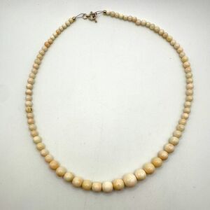 18" Graduated Angel Skin Coral beaded necklace w/ 14kt yellow gold toggle clasp!